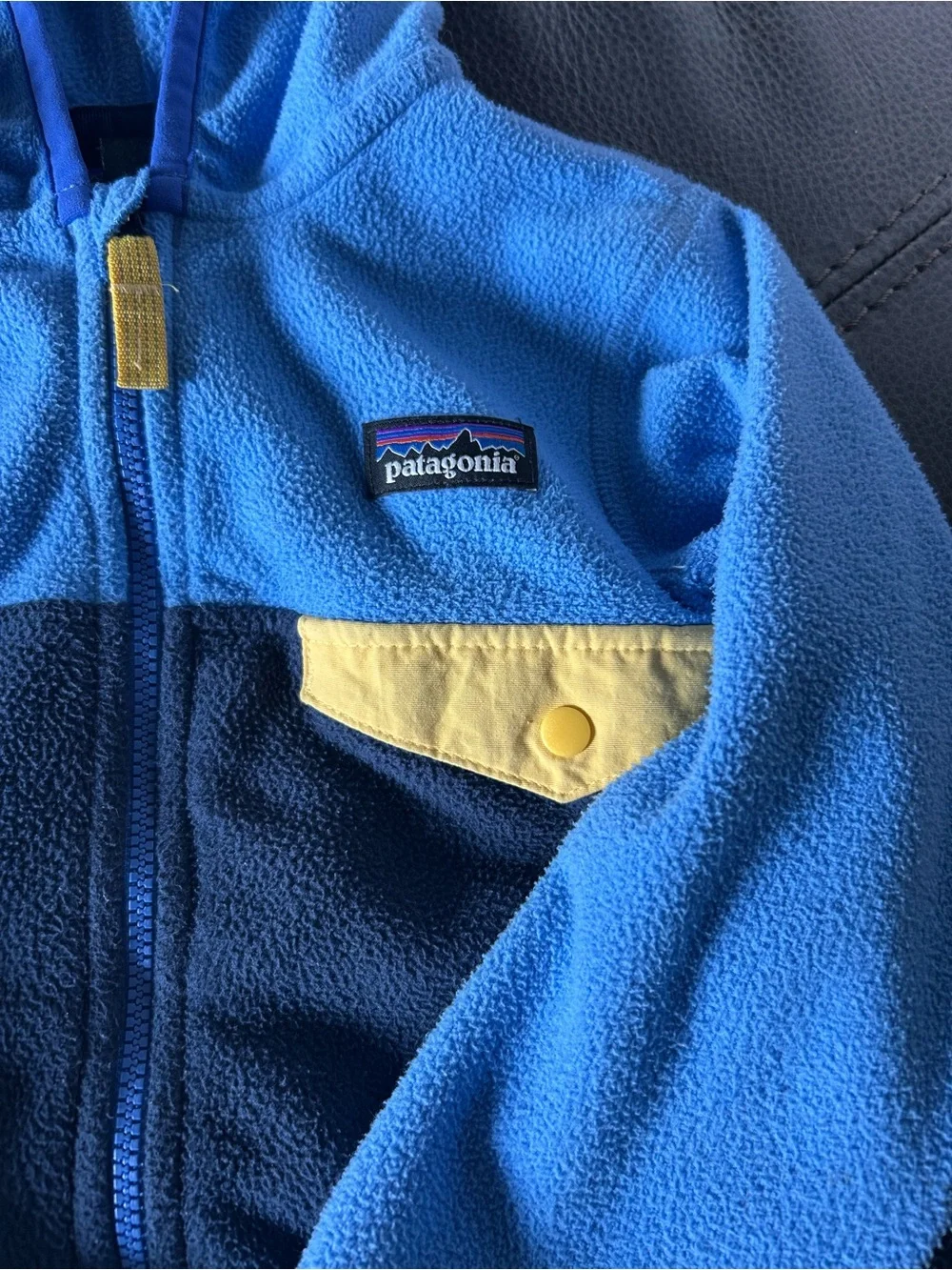 Patagonia Kids Blue & Navy Fleece Hoodie with Yellow Pocket Accent